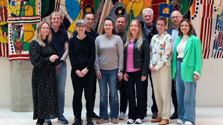 Elleve meritterte undervisere ved HVL. Fotografert på campus Bergen, K2, i forbindelse med samling i pedagogisk akademi 13. mai 2026.