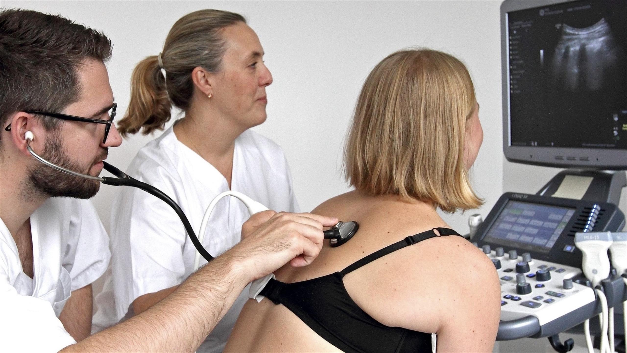 A patient for examination of her back.