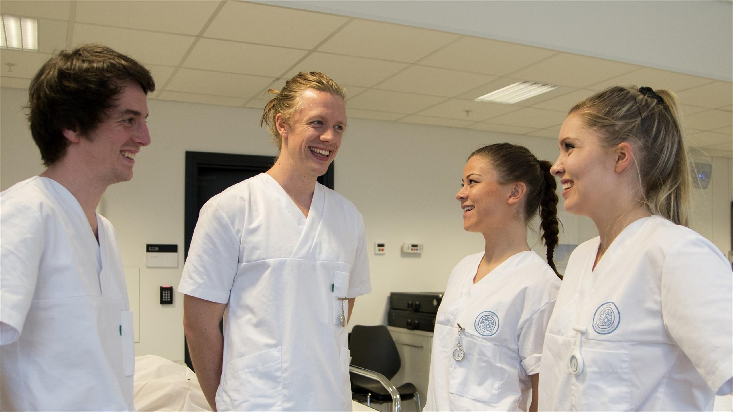 Four students in nurse practice