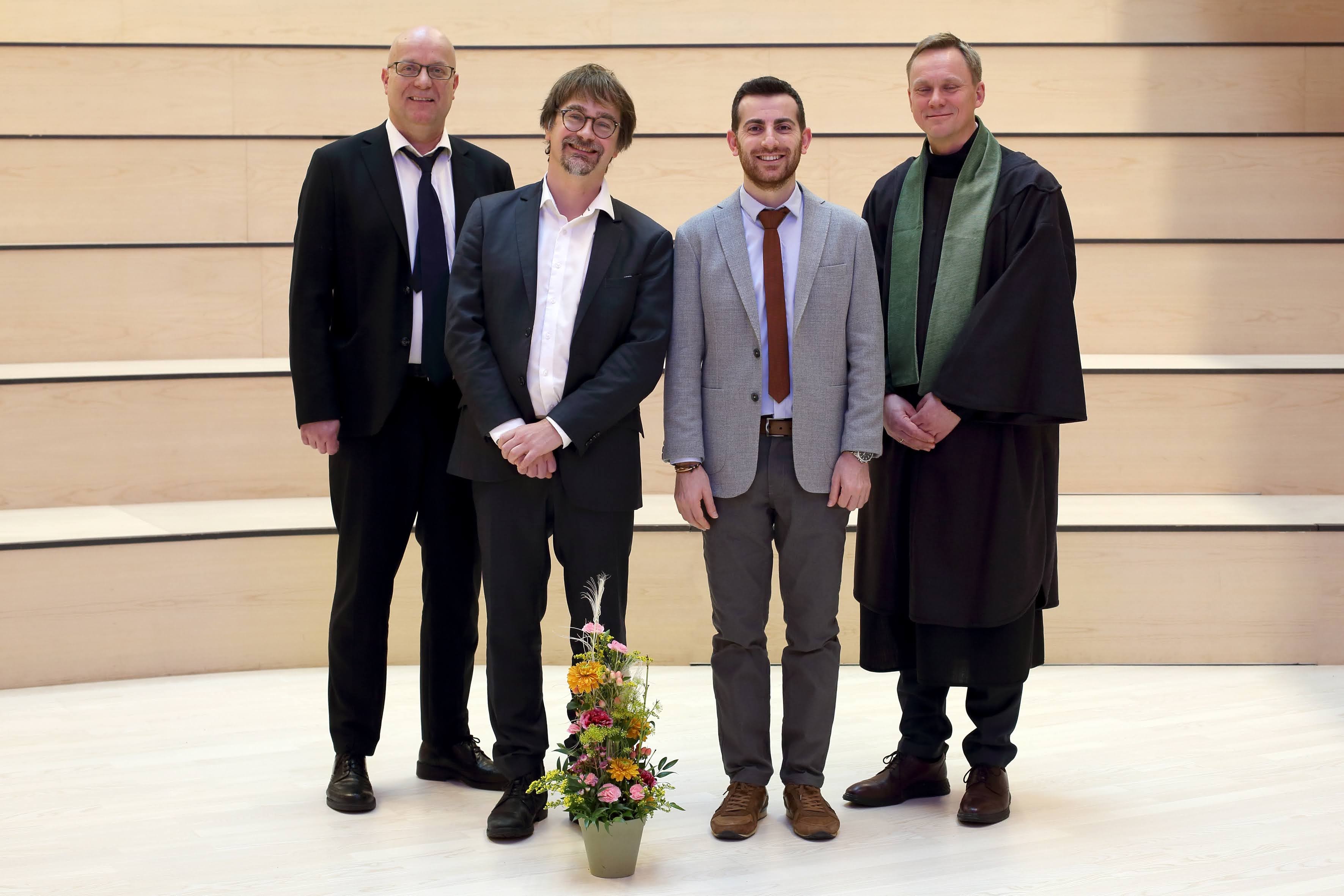 From the left, Stig-Erik Jakobsen (head of comittee), Lars Coenen (supervisor), Ridvan Cinar (canidate) og Jens Kristian Fosse (dean, FIN).