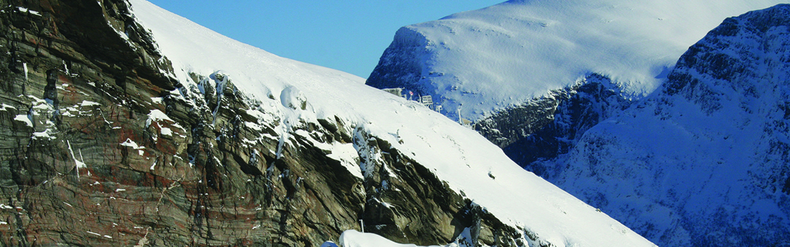 A station monitoring snow avalanche at a snow-covered mountain.